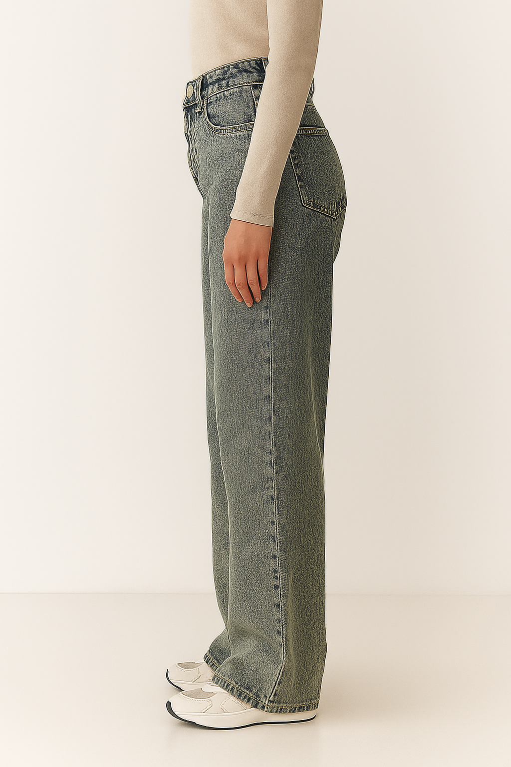 Damskie jeansy z wysokim stanem i prostymi nogawkami w spraniu vintage