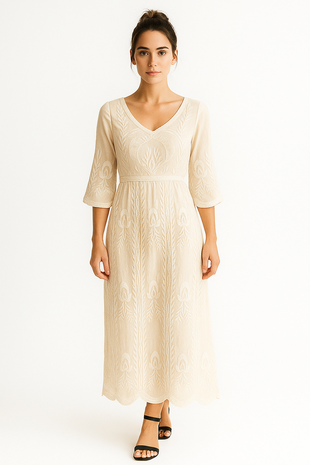 Długa biała sukienka z koronką i haftowanymi detalami